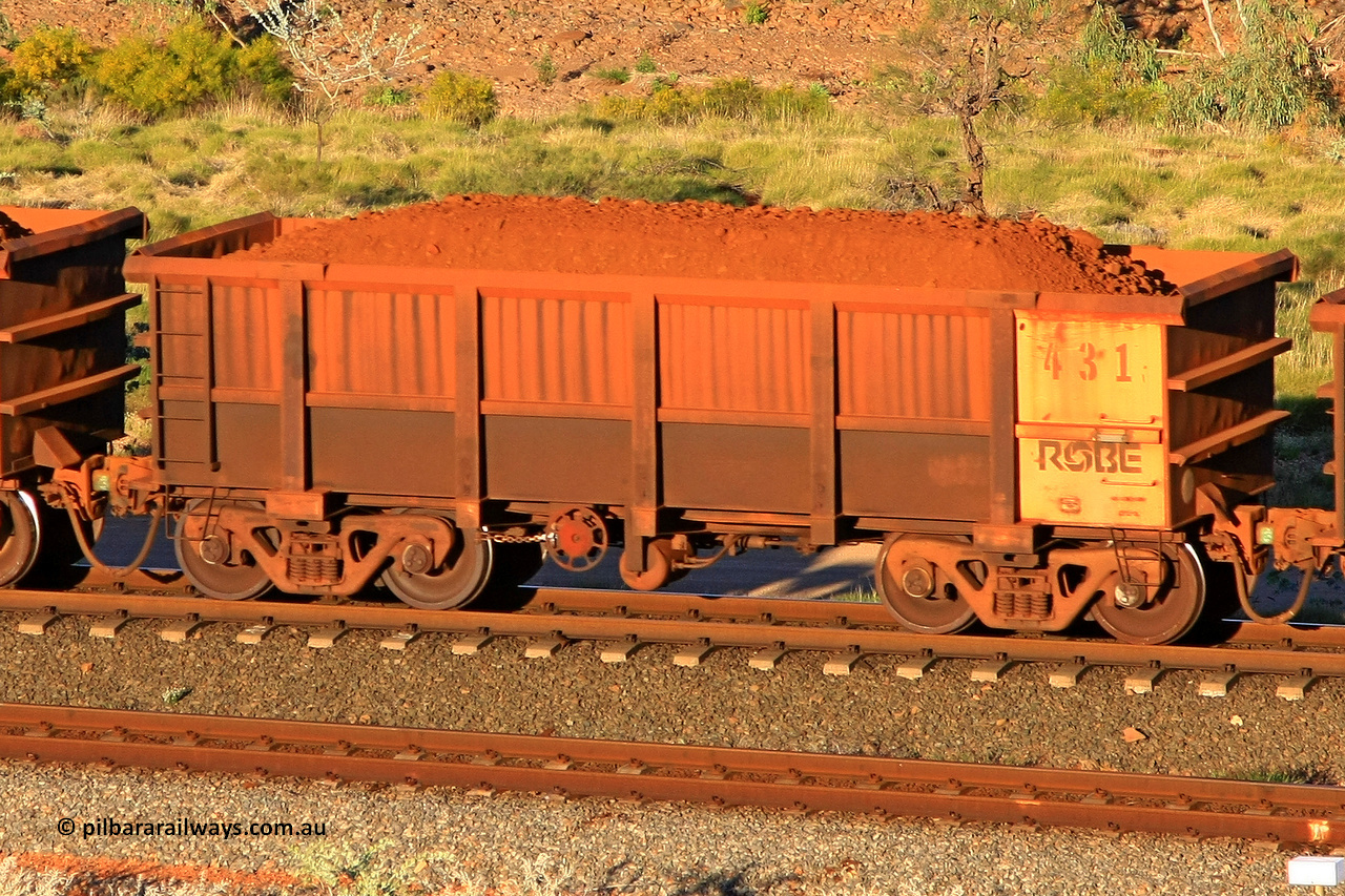 0431 110602 1682
Robe River ore waggon 431, built by Tomlinson Steel WA, rotary coupler end handbrake side loaded view at the 71 km, Western Creek on the Deepdale line. June 2, 2011.
Keywords: 431;Tomlinson-Steel-WA;Robe-ore-waggon;