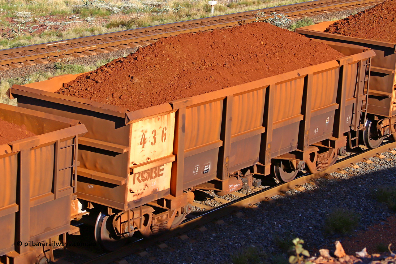 0436 210322 9754
Robe River ore waggon 436, built by Tomlinson Steel WA, rotary coupler end non-handbrake side loaded view at the 17 km on the Cape Lambert line, March 22, 2021.
Keywords: 436;Tomlinson-Steel-WA;Robe-ore-waggon;