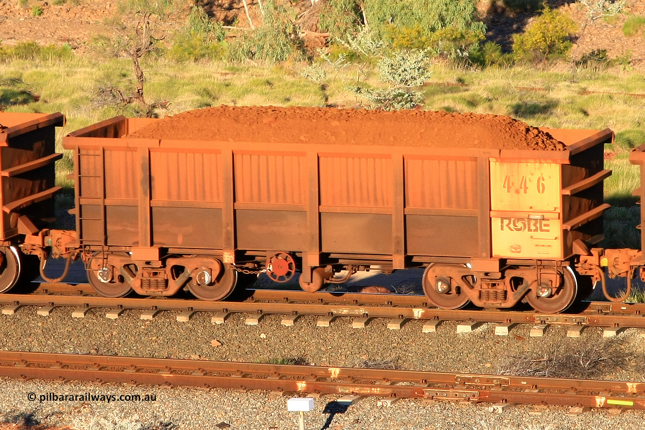 0446 110602 1603
Robe River ore waggon 446, built by Tomlinson Steel WA, rotary coupler end handbrake side loaded view at the 71 km, Western Creek on the Deepdale line. June 2, 2011.
Keywords: 446;Tomlinson-Steel-WA;Robe-ore-waggon;