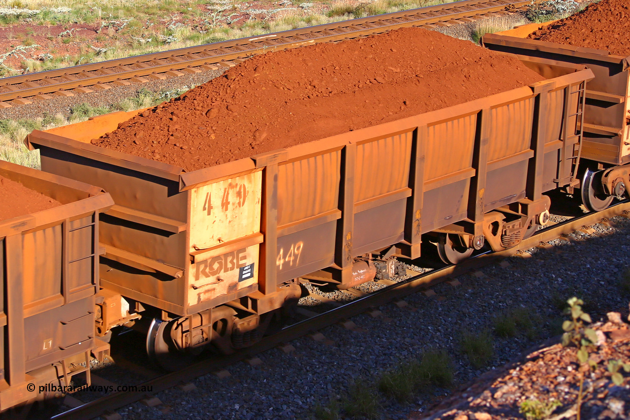 0449 210322 9688
Robe River ore waggon 449, built by Tomlinson Steel WA, rotary coupler end non-handbrake side loaded view at the 17 km on the Cape Lambert line, March 22, 2021.
Keywords: 449;Tomlinson-Steel-WA;Robe-ore-waggon;