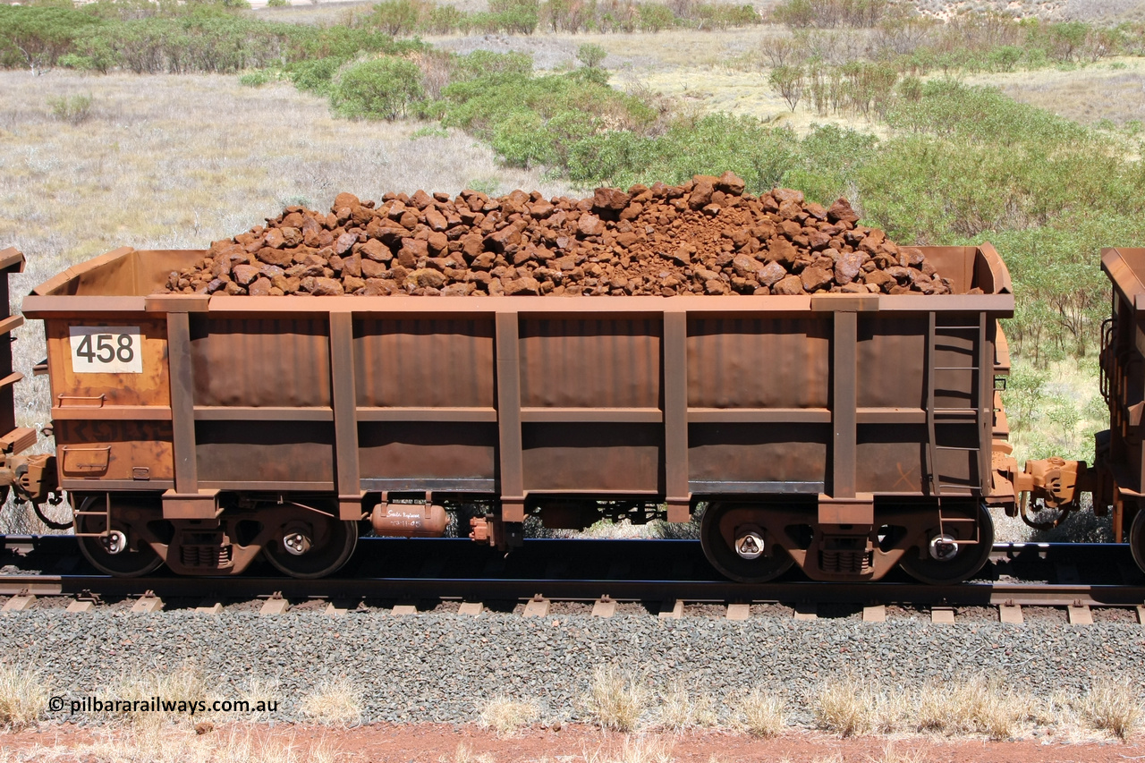 0458 081209 0117
Robe River ore waggon 458, built by Tomlinson Steel WA, non-handbrake side loaded view at the 7 km location just south of Cape Lambert yard. December 9, 2008.
Keywords: 458;Tomlinson-Steel-WA;Robe-ore-waggon;