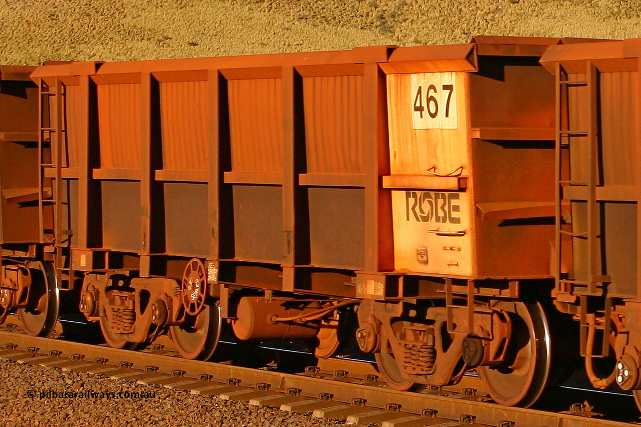 0467 060722 7605
Robe River ore waggon 467, built by Tomlinson Steel WA, rotary coupler end handbrake side empty view, at the 11.7 km, Cape Lambert. July 22, 2006.
Keywords: 467;Tomlinson-Steel-WA;Robe-ore-waggon;