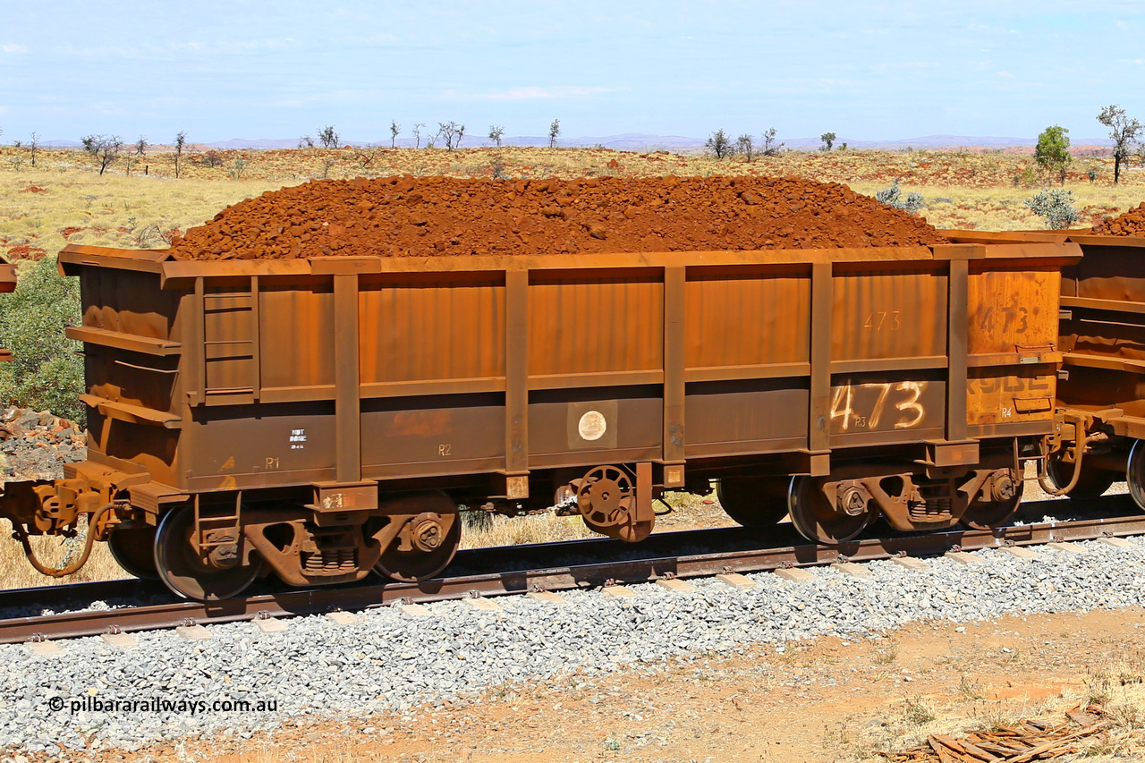 0473 170729 0205
Robe River ore waggon 473, built by Tomlinson Steel WA, fixed coupler handbrake side loaded view at the 103 km, between Maitland Siding and the Fortescue River on the Deepdale line. July 29, 2017.
Keywords: 473;Tomlinson-Steel-WA;Robe-ore-waggon;