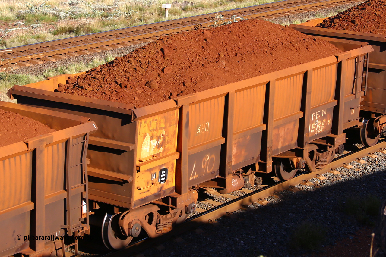 0490 210322 9779
Robe River ore waggon 490, built by Tomlinson Steel WA, rotary coupler end non-handbrake side loaded view at the 17 km on the Cape Lambert line, March 22, 2021.
Keywords: 490;Tomlinson-Steel-WA;Robe-ore-waggon;