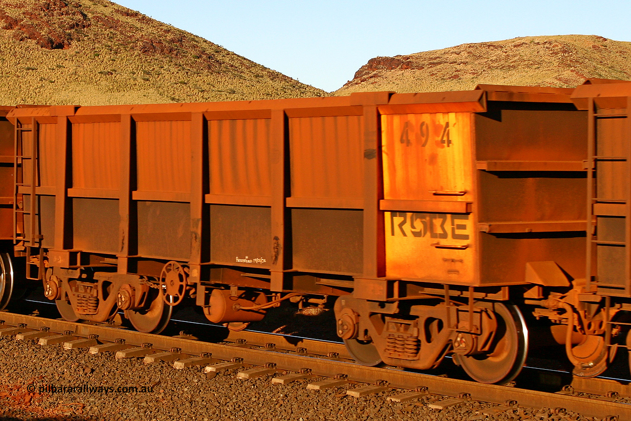 0494 060722 7610
Robe River ore waggon 494, built by Tomlinson Steel WA, rotary coupler end handbrake side empty view, at the 11.7 km, Cape Lambert. July 22, 2006.
Keywords: 494;Tomlinson-Steel-WA;Robe-ore-waggon;
