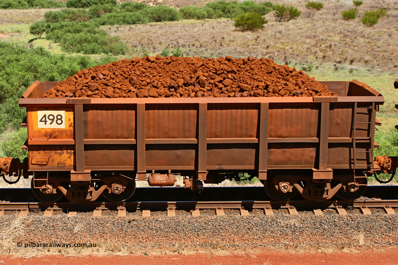 0498 061209 8184
Robe River ore waggon 498, built by Tomlinson Steel WA, non-handbrake side loaded view at the 7 km location just south of Cape Lambert yard. December 9, 2006.
Keywords: 498;Tomlinson-Steel-WA;Robe-ore-waggon;