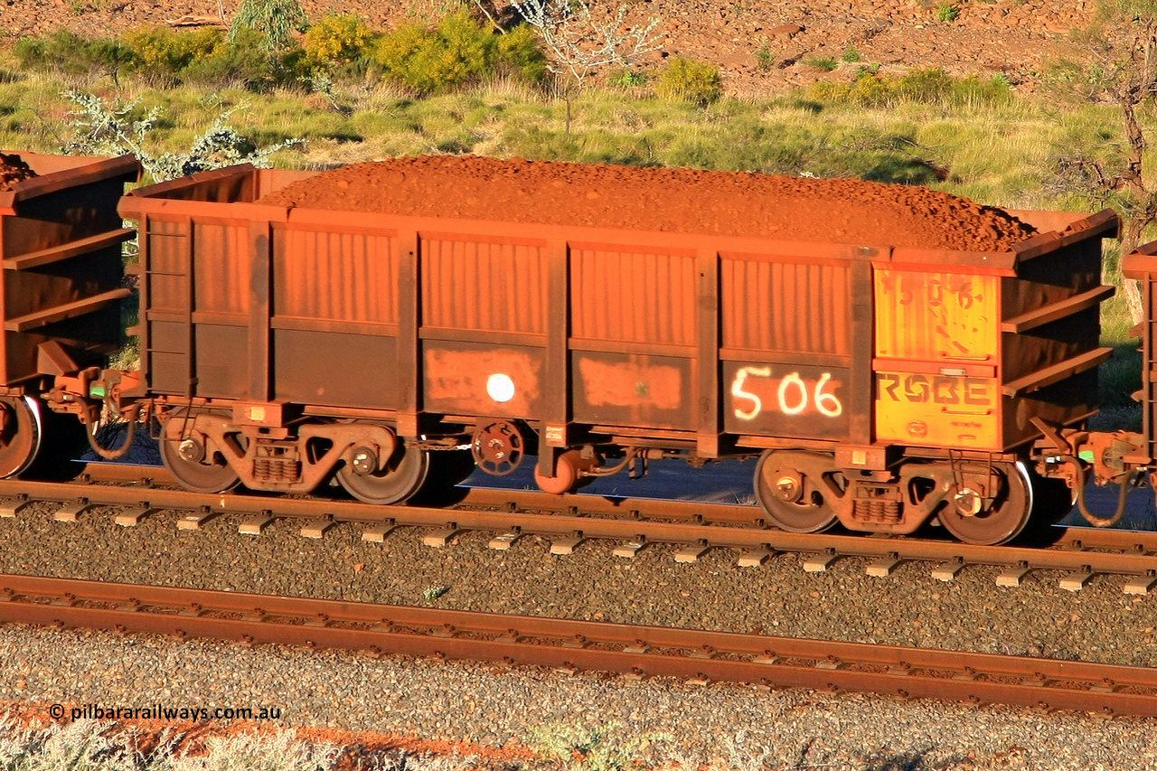 0506 110602 1723
Robe River ore waggon 506, built by Tomlinson Steel WA, rotary coupler end handbrake side loaded view at the 71 km, Western Creek on the Deepdale line. June 2, 2011.
Keywords: 506;Tomlinson-Steel-WA;Robe-ore-waggon;