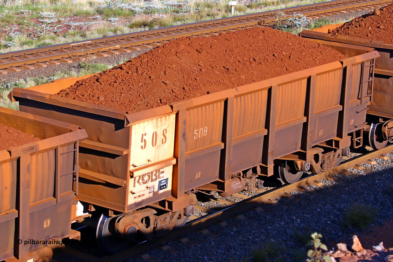 0508 210322 9747
Robe River ore waggon 508, built by Tomlinson Steel WA, rotary coupler end non-handbrake side loaded view at the 17 km on the Cape Lambert line, March 22, 2021.
Keywords: 508;Tomlinson-Steel-WA;Robe-ore-waggon;