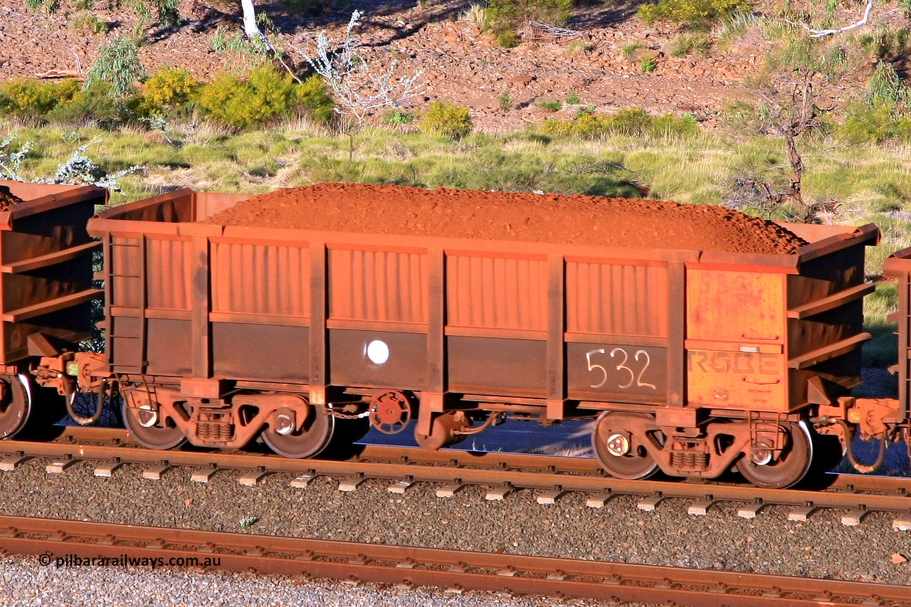 0532 110602 1717
Robe River ore waggon 532, built by Tomlinson Steel WA, rotary coupler end handbrake side loaded view at the 71 km, Western Creek on the Deepdale line. June 2, 2011.
Keywords: 532;Tomlinson-Steel-WA;Robe-ore-waggon;
