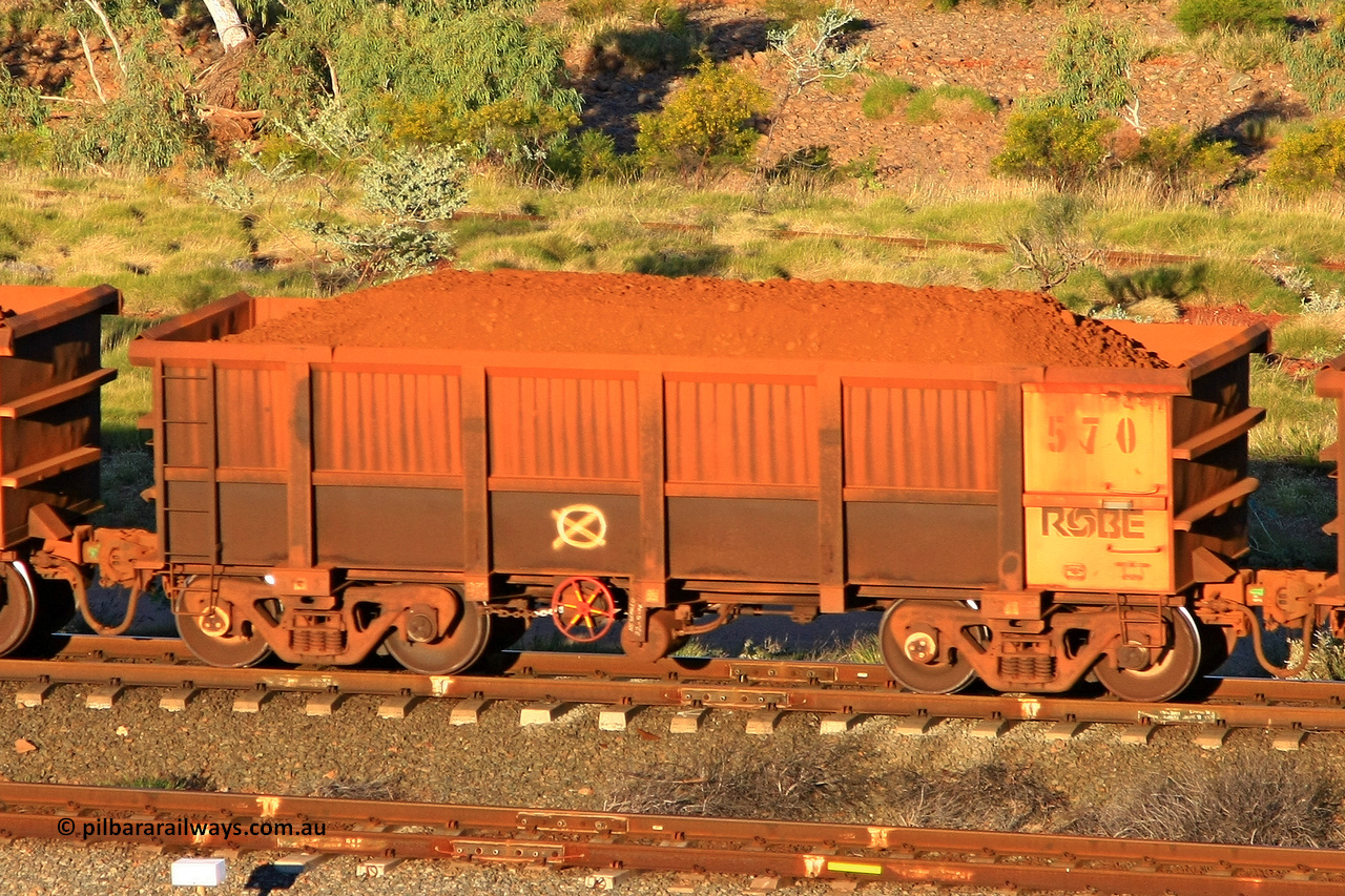 0570 110602 1667
Robe River ore waggon 570, built by Tomlinson Steel WA, rotary coupler end handbrake side loaded view at the 71 km, Western Creek on the Deepdale line. June 2, 2011.
Keywords: 570;Tomlinson-Steel-WA;Robe-ore-waggon;