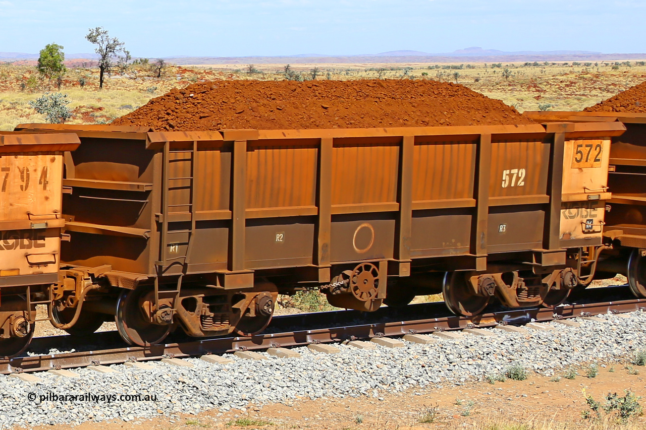 0572 170729 0211
Robe River ore waggon 572, built by Tomlinson Steel WA, fixed coupler handbrake side loaded view at the 103 km, between Maitland Siding and the Fortescue River on the Deepdale line. July 29, 2017.
Keywords: 572;Tomlinson-Steel-WA;Robe-ore-waggon;
