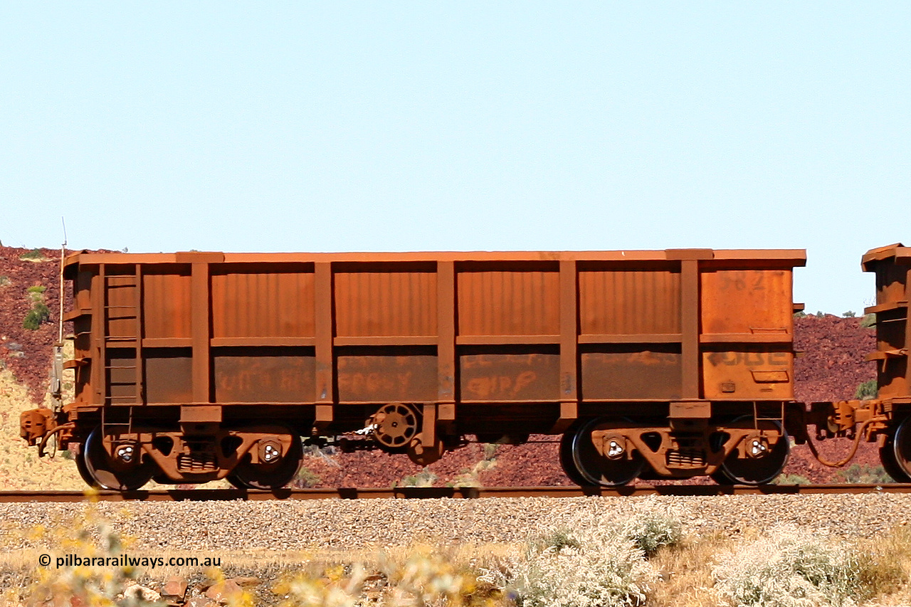 0582 060722 7449
Robe River ore waggon 582, built by Tomlinson Steel WA, handbrake side empty view at the 45.4 km just south of Harding Siding on the Cape Lambert line, end of train view. July 22, 2006.
Keywords: 582;Tomlinson-Steel-WA;Robe-ore-waggon;