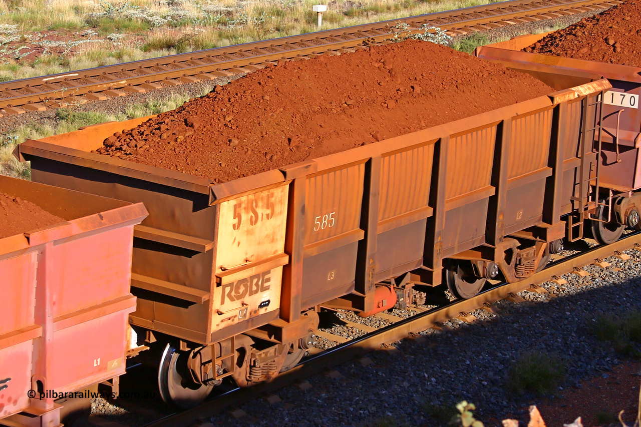 0585 210322 9763
Robe River ore waggon 585, built by Tomlinson Steel WA, rotary coupler end non-handbrake side loaded view at the 17 km on the Cape Lambert line, March 22, 2021.
Keywords: 585;Tomlinson-Steel-WA;Robe-ore-waggon;
