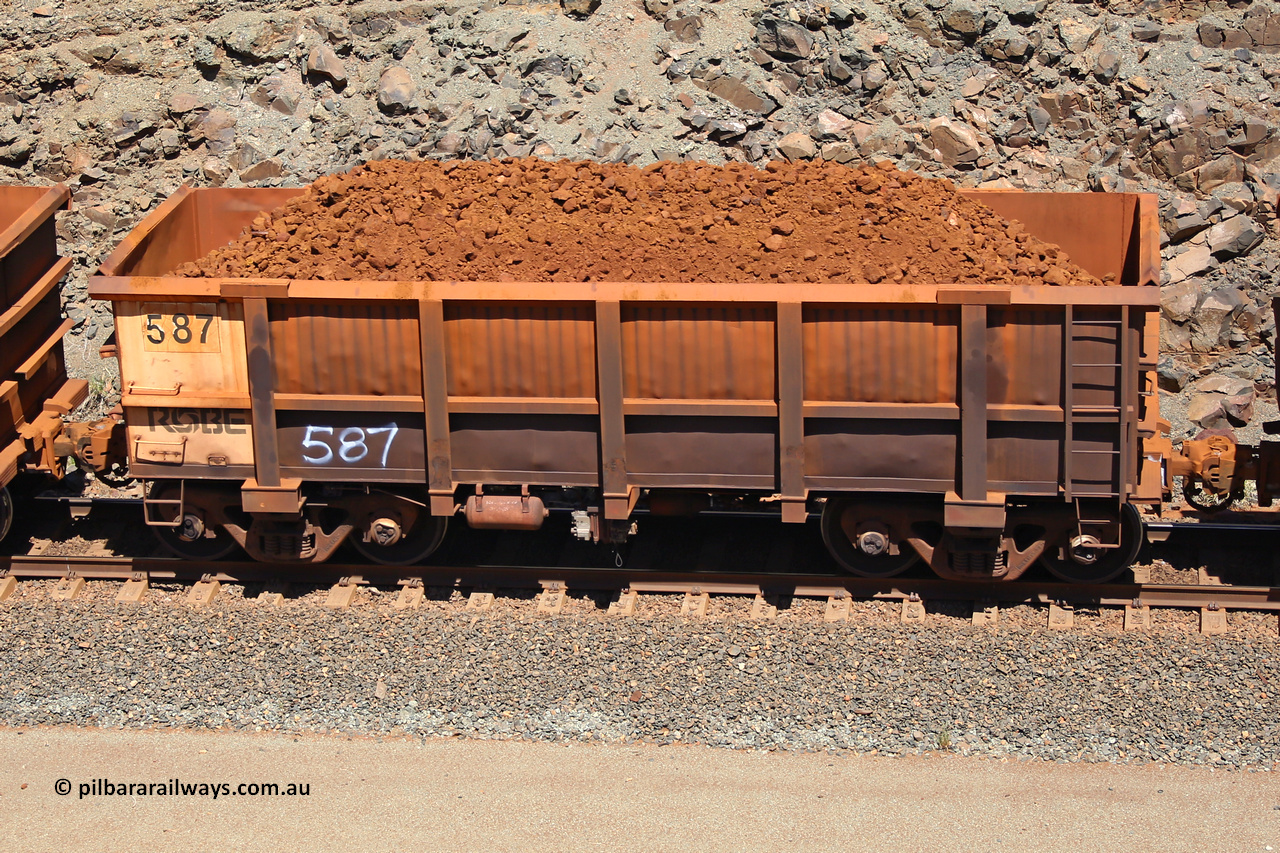 0587 160306 1522
Robe River ore waggon 587, built by Tomlinson Steel WA, fixed coupler non-handbrake side loaded view, at the 45 km, Harding Siding on the Cape Lambert line. March 6, 2016.
Keywords: 587;Tomlinson-Steel-WA;Robe-ore-waggon;