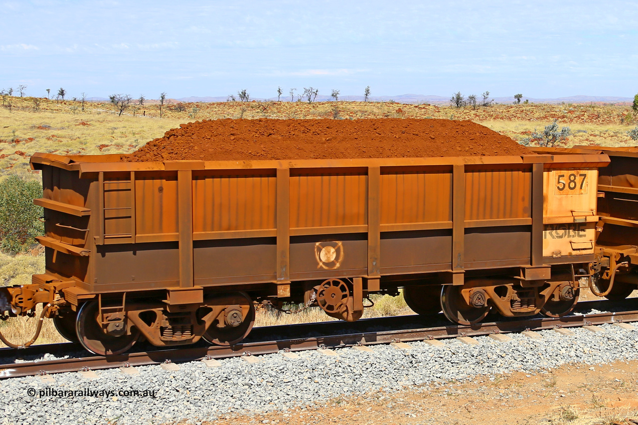 0587 170729 0249
Robe River ore waggon 587, built by Tomlinson Steel WA, fixed coupler handbrake side loaded view at the 103 km, between Maitland Siding and the Fortescue River on the Deepdale line. July 29, 2017.
Keywords: 587;Tomlinson-Steel-WA;Robe-ore-waggon;