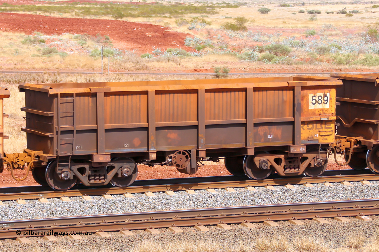 0589 141124 6834
Robe River ore waggon 589, built by Tomlinson Steel WA, fixed coupler handbrake side empty view at the 25 km at Arches Siding on the Cape Lambert line. November 24, 2014.
Keywords: 589;Tomlinson-Steel-WA;Robe-ore-waggon;