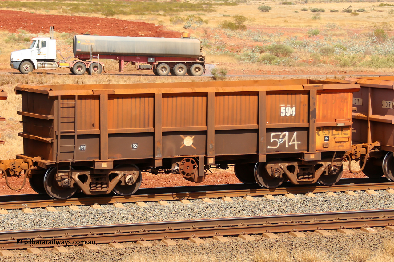 0594 141124 6821
Robe River ore waggon 594, built by Tomlinson Steel WA, fixed coupler handbrake side empty view at the 25 km at Arches Siding on the Cape Lambert line. November 24, 2014.
Keywords: 594;Tomlinson-Steel-WA;Robe-ore-waggon;