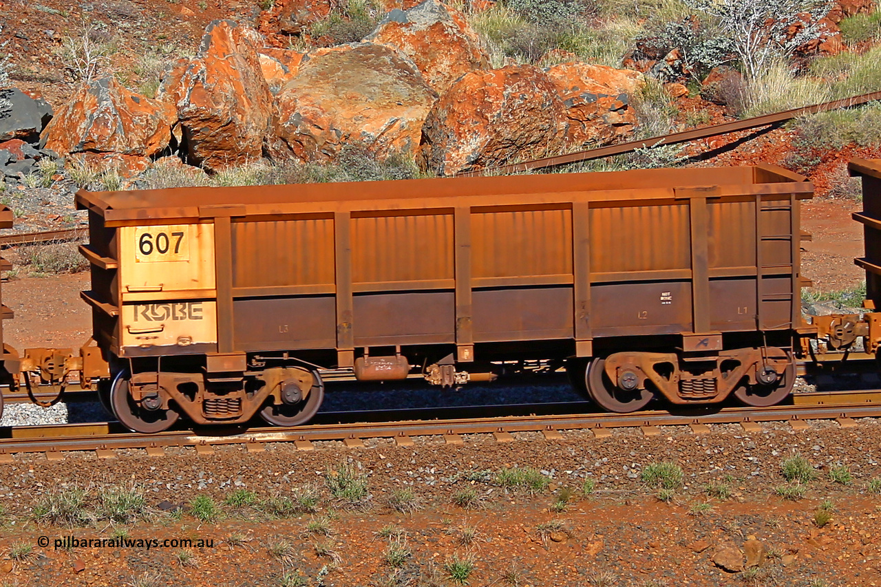 0607 180616 1728
Robe River ore waggon 607, built by Tomlinson Steel WA, rotary coupler end non-handbrake side empty view at the 38 km, Harding on the Cape Lambert line, June 16, 2018.
Keywords: 607;Tomlinson-Steel-WA;Robe-ore-waggon;