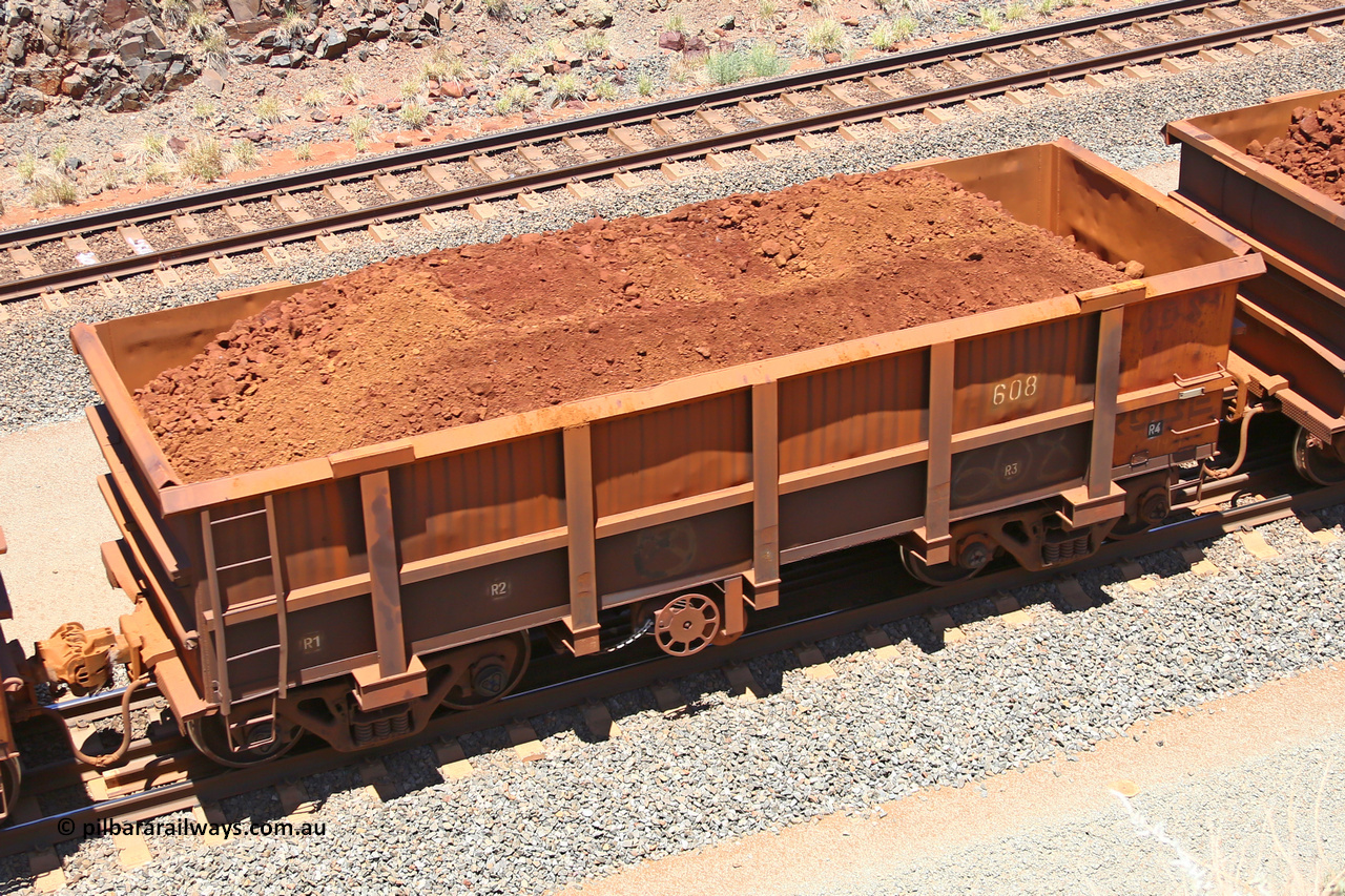 0608 160306 1468
Robe River ore waggon 608, built by Tomlinson Steel WA, fixed coupler handbrake side loaded view, at the 45 km, Harding Siding on the Cape Lambert line. March 6, 2016.
Keywords: 608;Tomlinson-Steel-WA;Robe-ore-waggon;