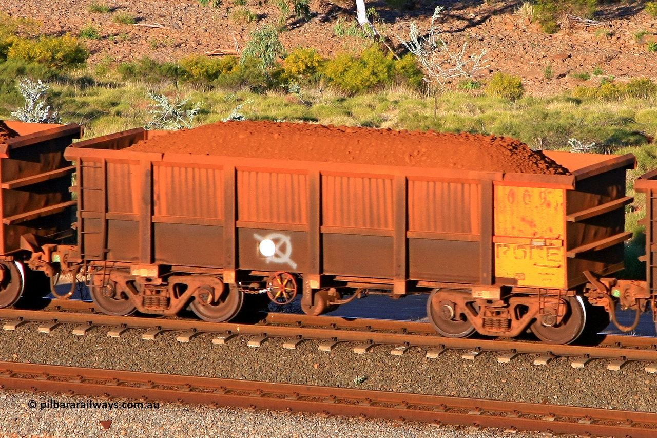 0609 110602 1696
Robe River ore waggon 609, built by Tomlinson Steel WA, rotary coupler end handbrake side loaded view at the 71 km, Western Creek on the Deepdale line. June 2, 2011.
Keywords: 609;Tomlinson-Steel-WA;Robe-ore-waggon;