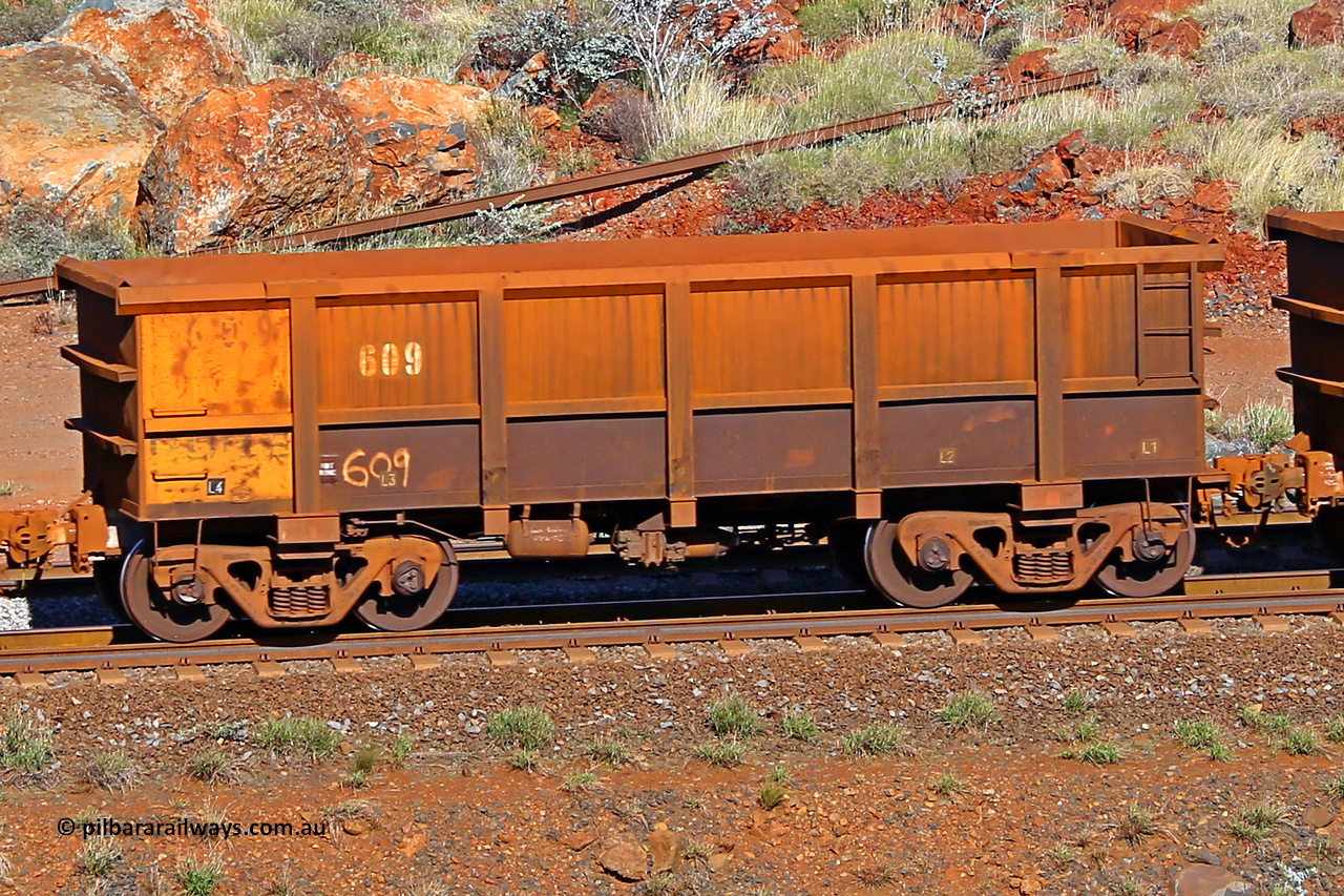 0609 180616 1711
Robe River ore waggon 609, built by Tomlinson Steel WA, rotary coupler end non-handbrake side empty view at the 38 km, Harding on the Cape Lambert line, June 16, 2018.
Keywords: 609;Tomlinson-Steel-WA;Robe-ore-waggon;