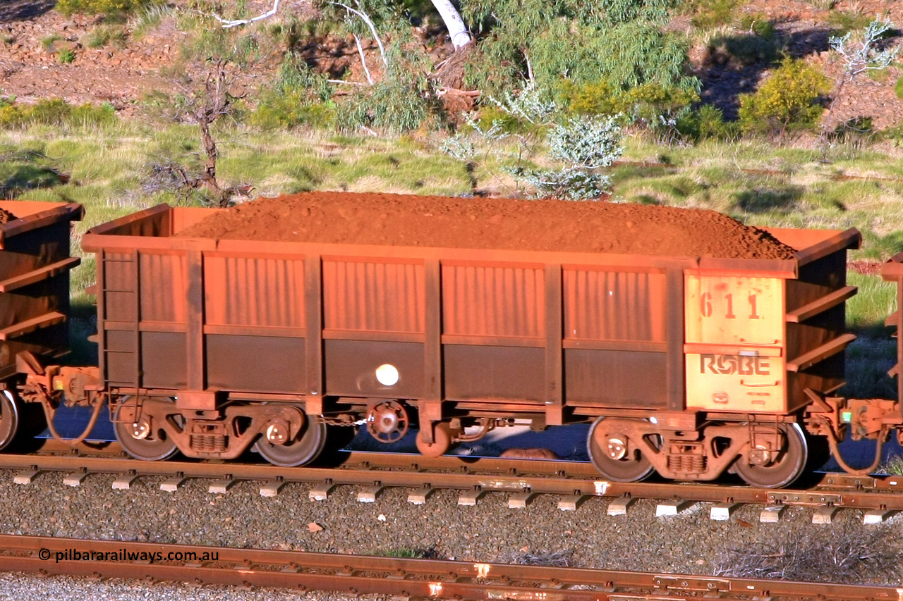 0611 110602 1638
Robe River ore waggon 611, built by Tomlinson Steel WA, rotary coupler end handbrake side loaded view at the 71 km, Western Creek on the Deepdale line. June 2, 2011.
Keywords: 611;Tomlinson-Steel-WA;Robe-ore-waggon;