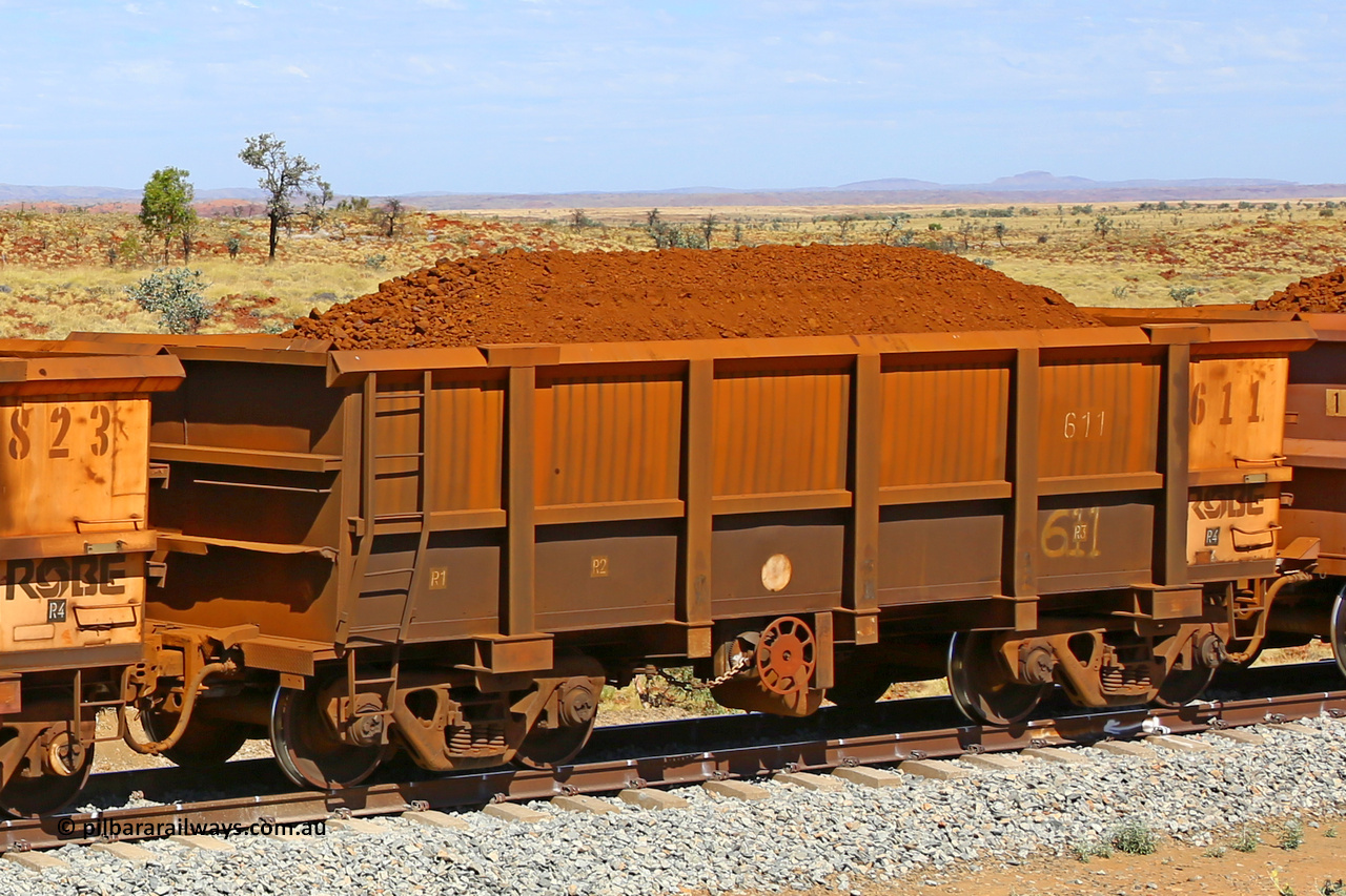 0611 170729 0262
Robe River ore waggon 611, built by Tomlinson Steel WA, fixed coupler handbrake side loaded view at the 103 km, between Maitland Siding and the Fortescue River on the Deepdale line. July 29, 2017.
Keywords: 611;Tomlinson-Steel-WA;Robe-ore-waggon;