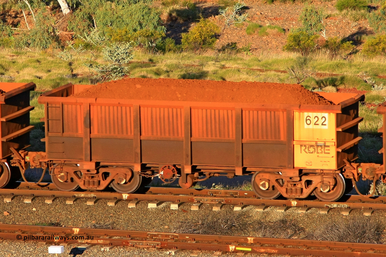 0622 110602 1672
Robe River ore waggon 622, built by Tomlinson Steel WA, rotary coupler end handbrake side loaded view at the 71 km, Western Creek on the Deepdale line. June 2, 2011.
Keywords: 622;Tomlinson-Steel-WA;Robe-ore-waggon;