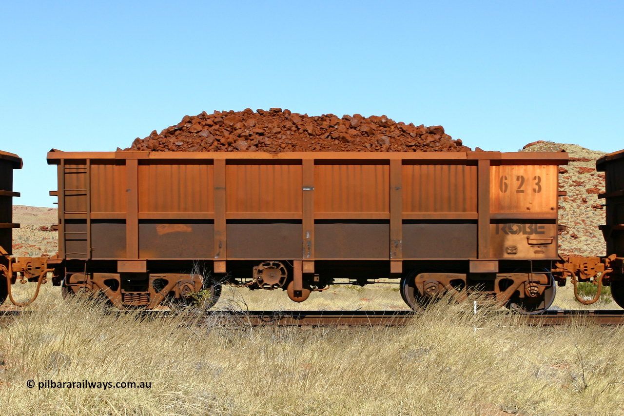 0623 060722 7507
Robe River ore waggon 623, built by Tomlinson Steel WA, handbrake side loaded view at the 78.8 km between Western Creek and Maitland on the Deepdale line. July 22, 2006.
Keywords: 623;Tomlinson-Steel-WA;Robe-ore-waggon;