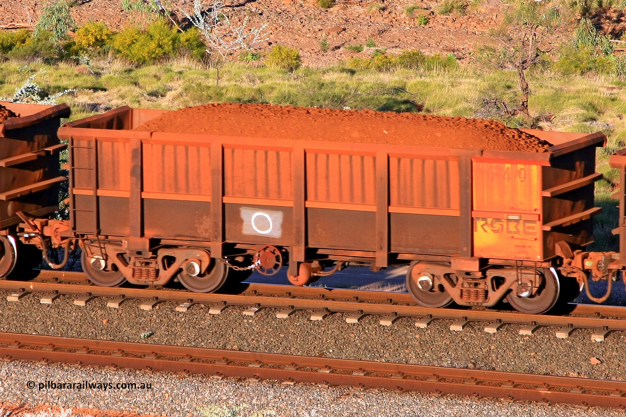 0640 110602 1731
Robe River ore waggon 640, built by Tomlinson Steel WA, rotary coupler end handbrake side loaded view at the 71 km, Western Creek on the Deepdale line. June 2, 2011.
Keywords: 640;Tomlinson-Steel-WA;Robe-ore-waggon;