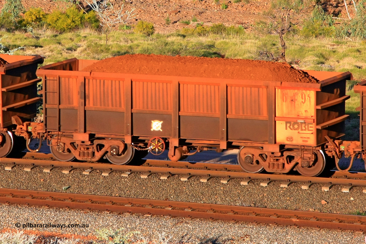 0649 110602 1691
Robe River ore waggon 646, built by Tomlinson Steel WA, rotary coupler end handbrake side loaded view at the 71 km, Western Creek on the Deepdale line. June 2, 2011.
Keywords: 649;Tomlinson-Steel-WA;Robe-ore-waggon;