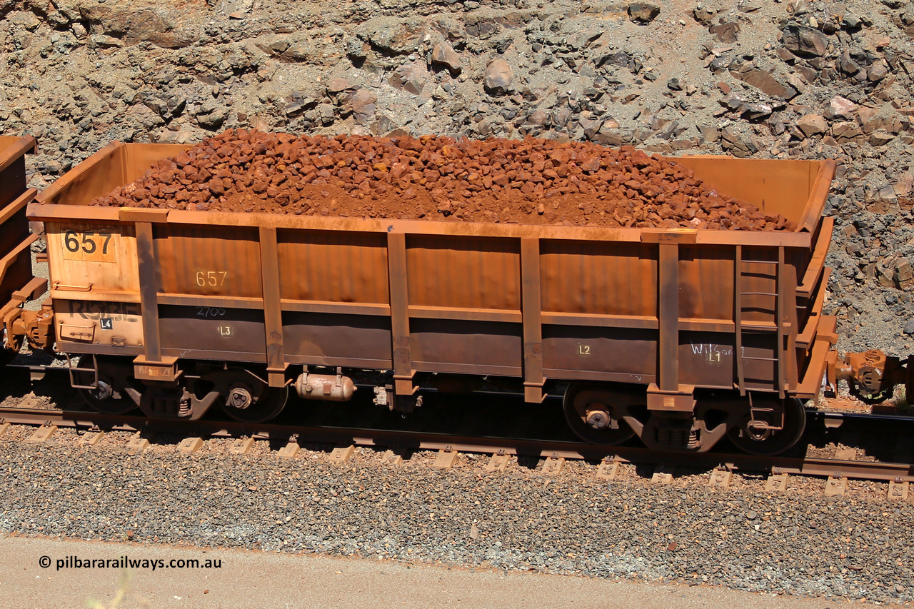 0657 160306 1657
Robe River ore waggon 657, built by Tomlinson Steel WA, fixed coupler non-handbrake side loaded view, at the 45 km, Harding Siding on the Cape Lambert line. March 6, 2016.
Keywords: 657;Tomlinson-Steel-WA;Robe-ore-waggon;