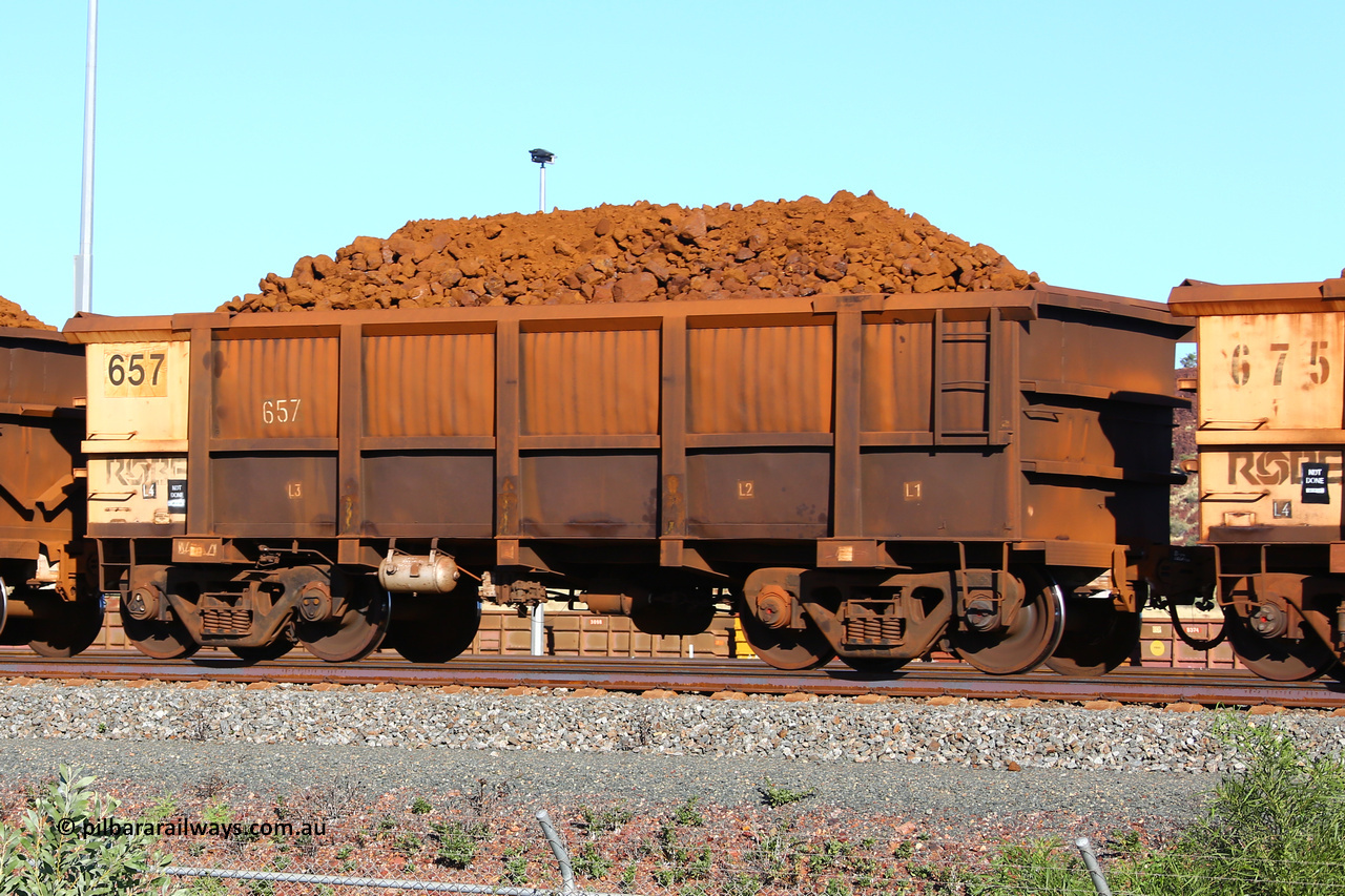 0657 210322 9385
Robe River ore waggon 657, built by Tomlinson Steel WA, fixed coupler non-handbrake side loaded view at Cape Lambert yard, March 22, 2021.
Keywords: 657;Tomlinson-Steel-WA;Robe-ore-waggon;