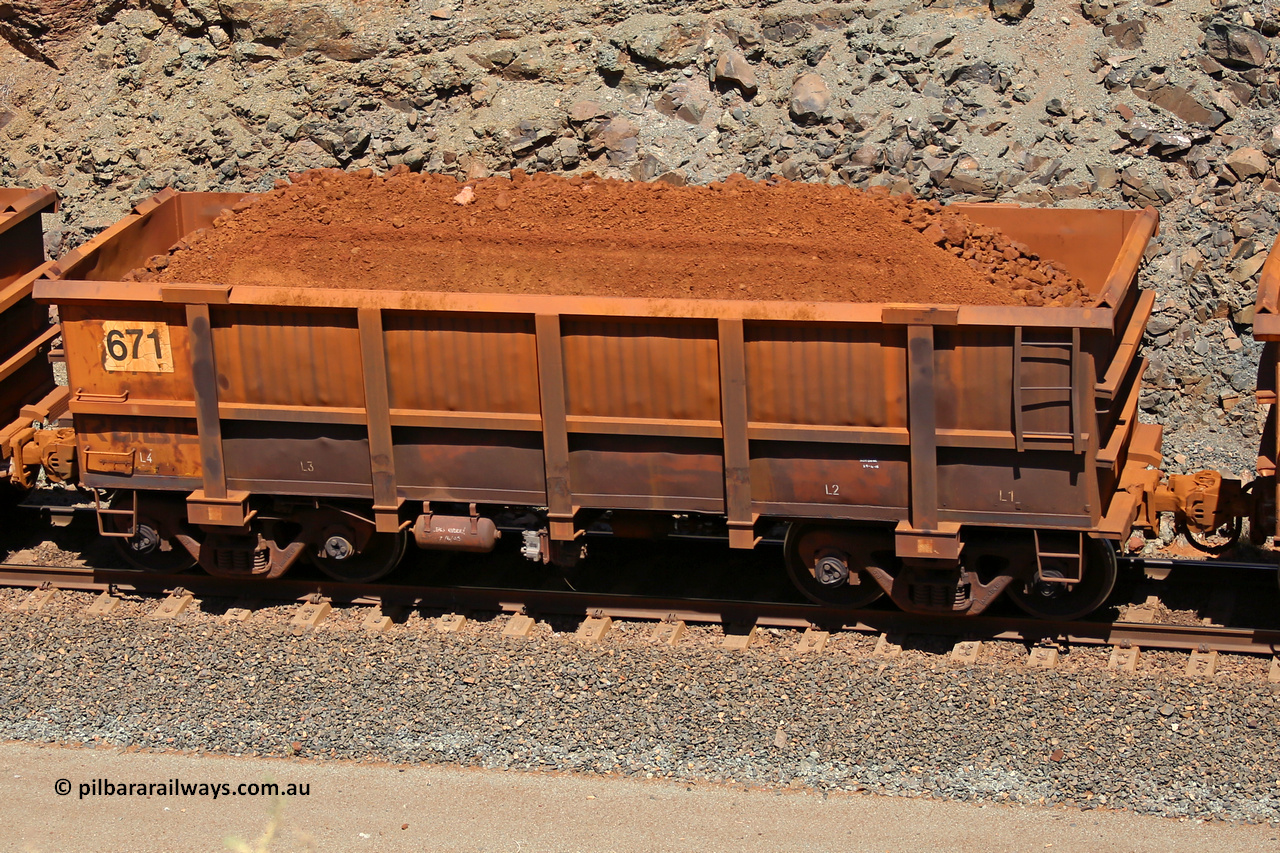 0671 160306 1628
Robe River ore waggon 671, built by Tomlinson Steel WA, fixed coupler non-handbrake side loaded view, at the 45 km, Harding Siding on the Cape Lambert line. March 6, 2016.
Keywords: 671;Tomlinson-Steel-WA;Robe-ore-waggon;