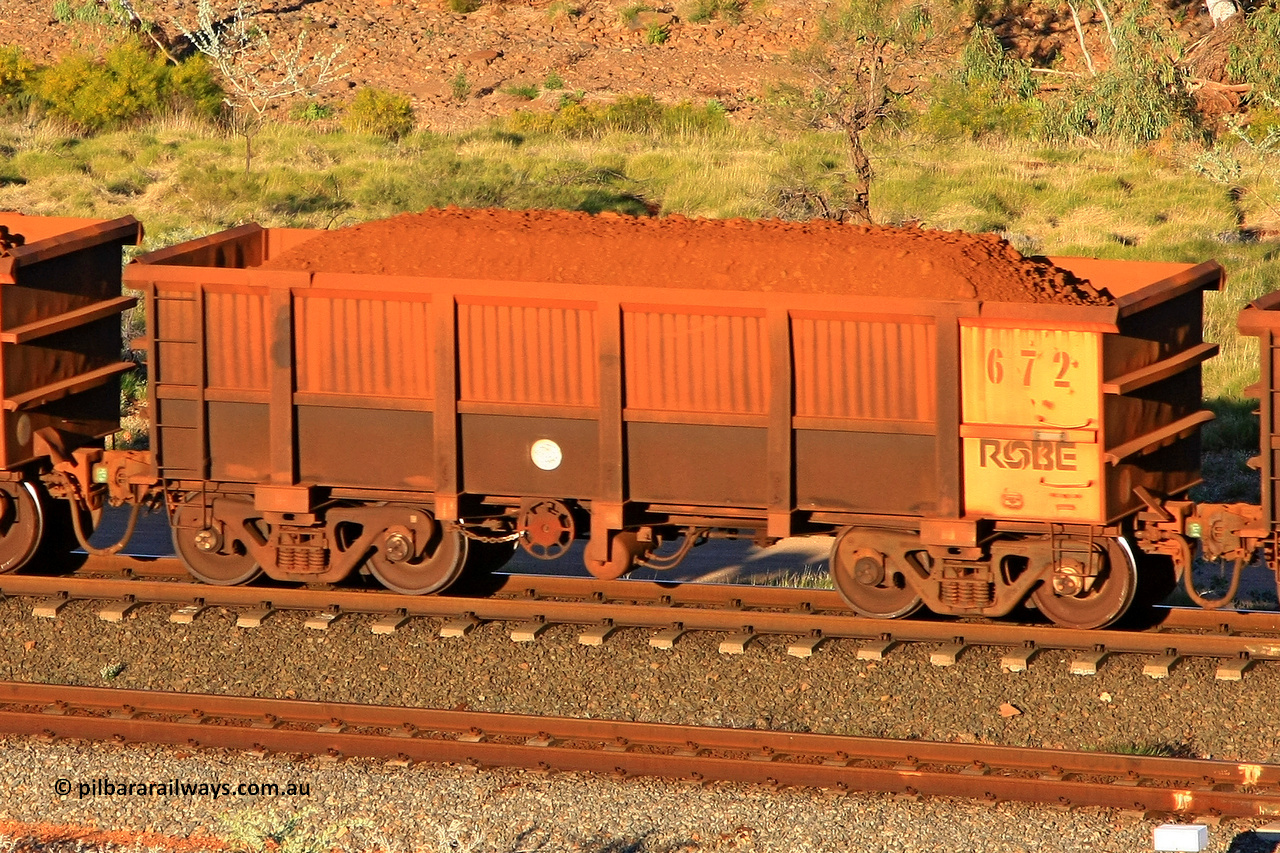 0672 110602 1683
Robe River ore waggon 672, built by Tomlinson Steel WA, rotary coupler end handbrake side loaded view at the 71 km, Western Creek on the Deepdale line. June 2, 2011.
Keywords: 672;Tomlinson-Steel-WA;Robe-ore-waggon;