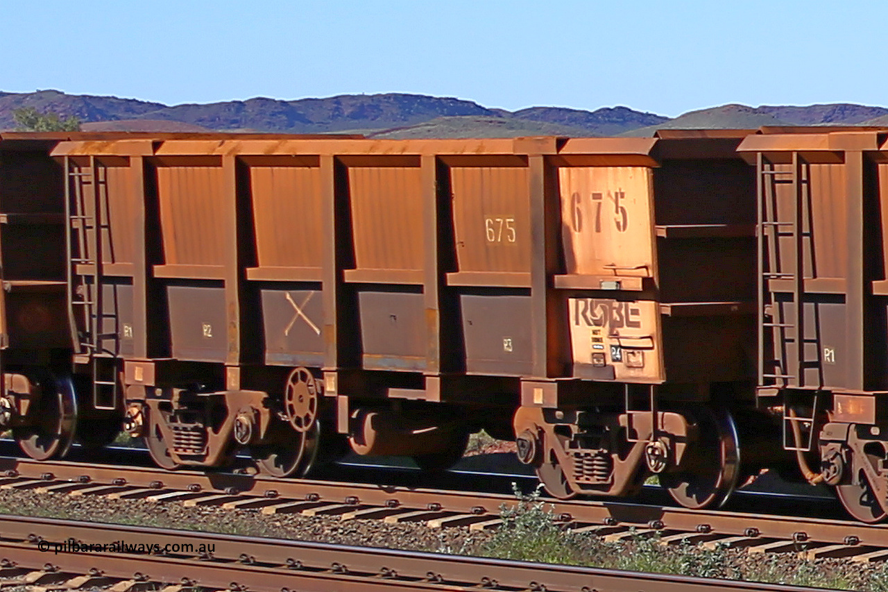 0675 160727 0980
Robe River ore waggon 675, built by Tomlinson Steel WA, rotary coupler end handbrake side empty view at Harding Siding on the Cape Lambert line, July 27, 2016.
Keywords: 675;Tomlinson-Steel-WA;Robe-ore-waggon;
