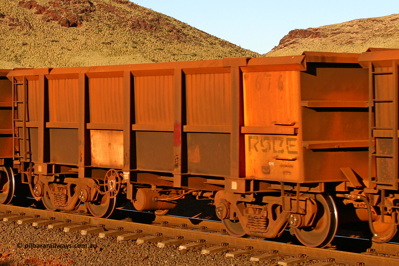 0676 060722 7632
Robe River ore waggon 676, built by Tomlinson Steel WA, rotary coupler end handbrake side empty view, at the 11.7 km, Cape Lambert. July 22, 2006.
Keywords: 676;Tomlinson-Steel-WA;Robe-ore-waggon;