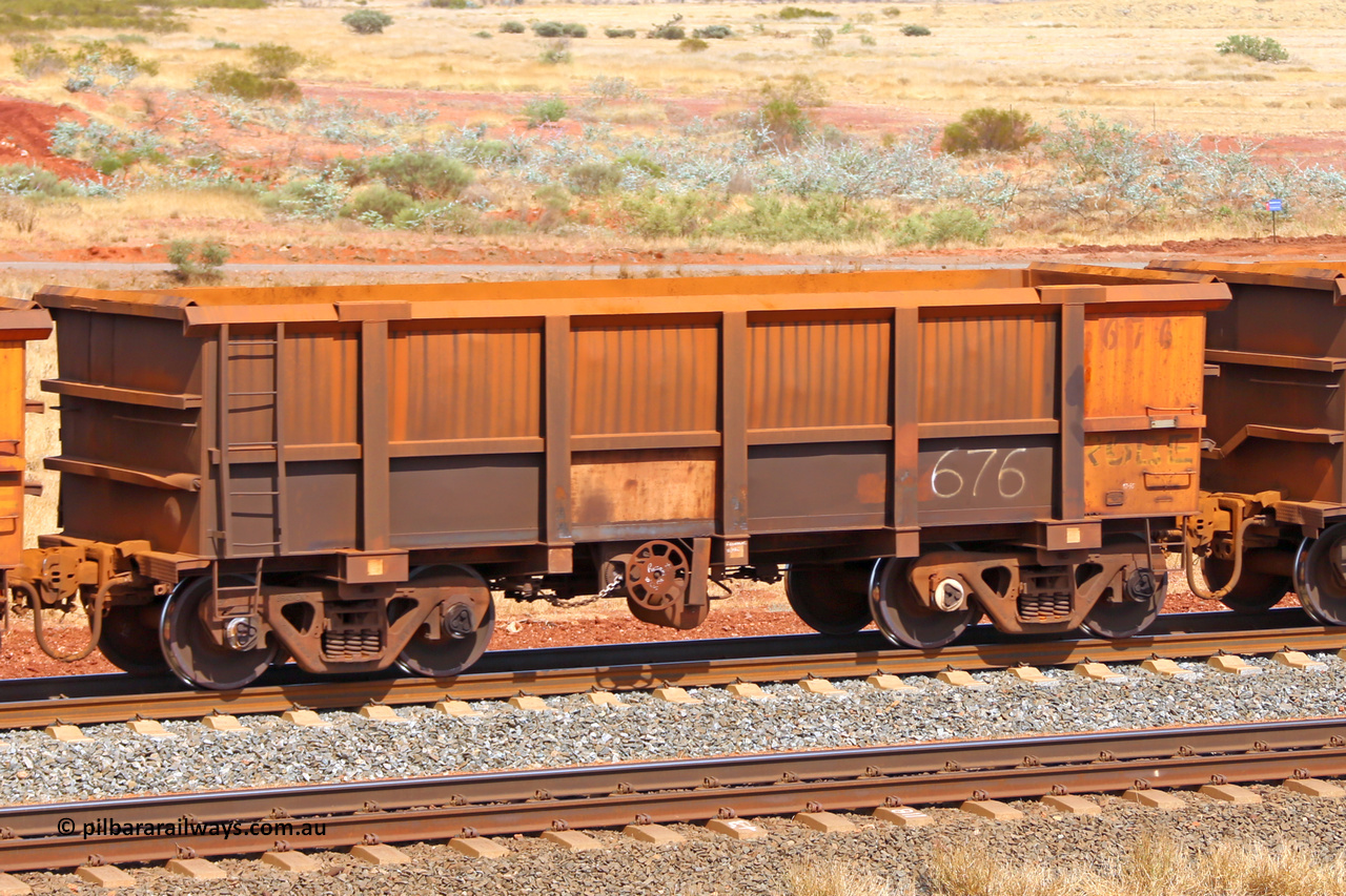 0676 141124 6782
Robe River ore waggon 676, built by Tomlinson Steel WA, fixed coupler handbrake side empty view at the 25 km at Arches Siding on the Cape Lambert line. November 24, 2014.
Keywords: 676;Tomlinson-Steel-WA;Robe-ore-waggon;