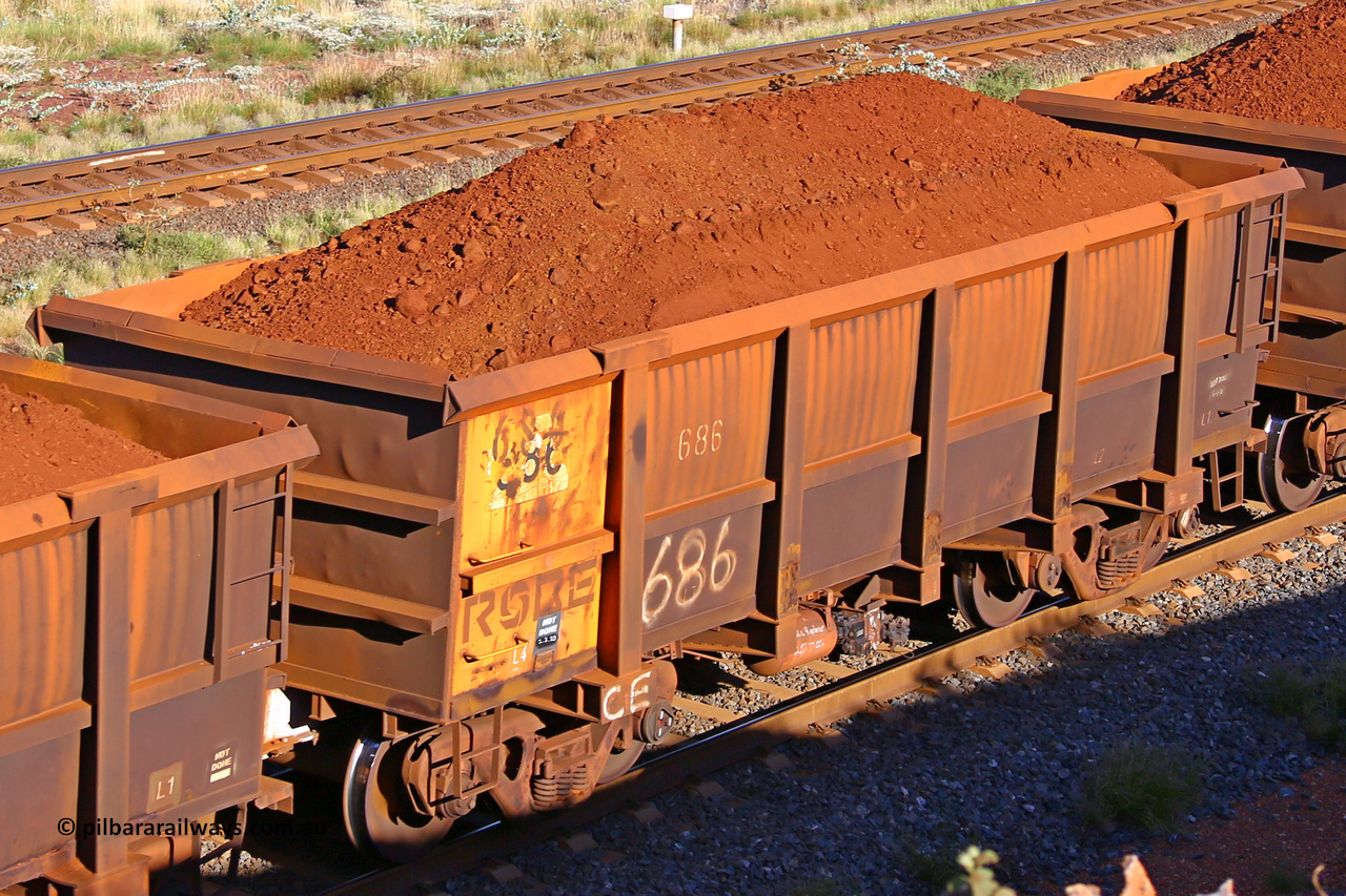 0686 210322 9768
Robe River ore waggon 686, built by Tomlinson Steel WA, rotary coupler end non-handbrake side loaded view at the 17 km on the Cape Lambert line, March 22, 2021.
Keywords: 686;Tomlinson-Steel-WA;Robe-ore-waggon;