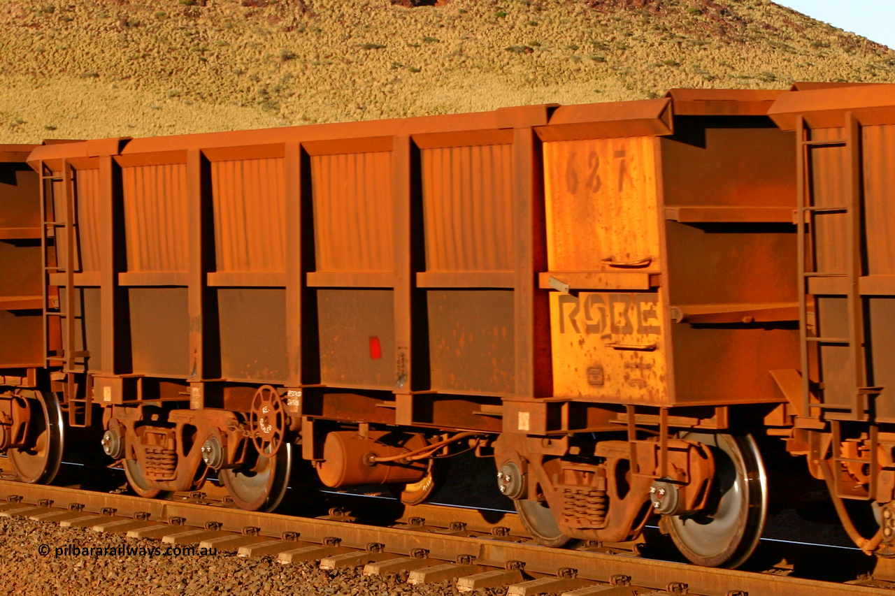 0687 060722 7590
Robe River ore waggon 687, built by Tomlinson Steel WA, rotary coupler end handbrake side empty view, at the 11.7 km, Cape Lambert. July 22, 2006.
Keywords: 687;Tomlinson-Steel-WA;Robe-ore-waggon;