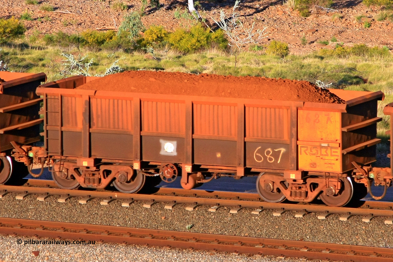 0687 110602 1697
Robe River ore waggon 687, built by Tomlinson Steel WA, rotary coupler end handbrake side loaded view at the 71 km, Western Creek on the Deepdale line. June 2, 2011.
Keywords: 687;Tomlinson-Steel-WA;Robe-ore-waggon;