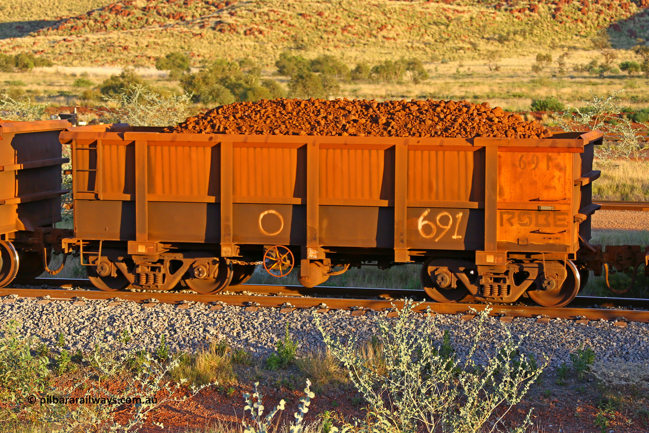 0691 170513 8690
Robe River ore waggon 691, built by Tomlinson Steel WA, rotary coupler end handbrake side loaded view, Cape Lambert yard, May 13, 2017.
Keywords: 691;Tomlinson-Steel-WA;Robe-ore-waggon;