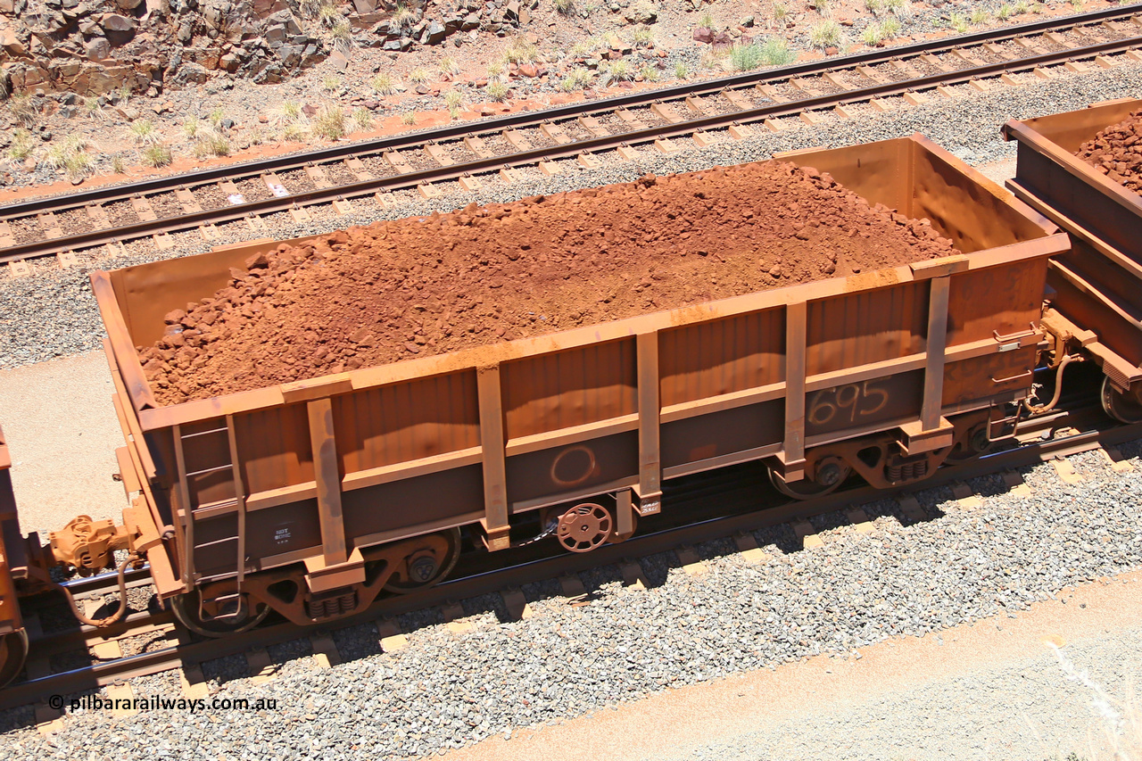 0695 160306 1482
Robe River ore waggon 695, built by Tomlinson Steel WA, fixed coupler handbrake side loaded view, at the 45 km, Harding Siding on the Cape Lambert line. March 6, 2016.
Keywords: 695;Tomlinson-Steel-WA;Robe-ore-waggon;