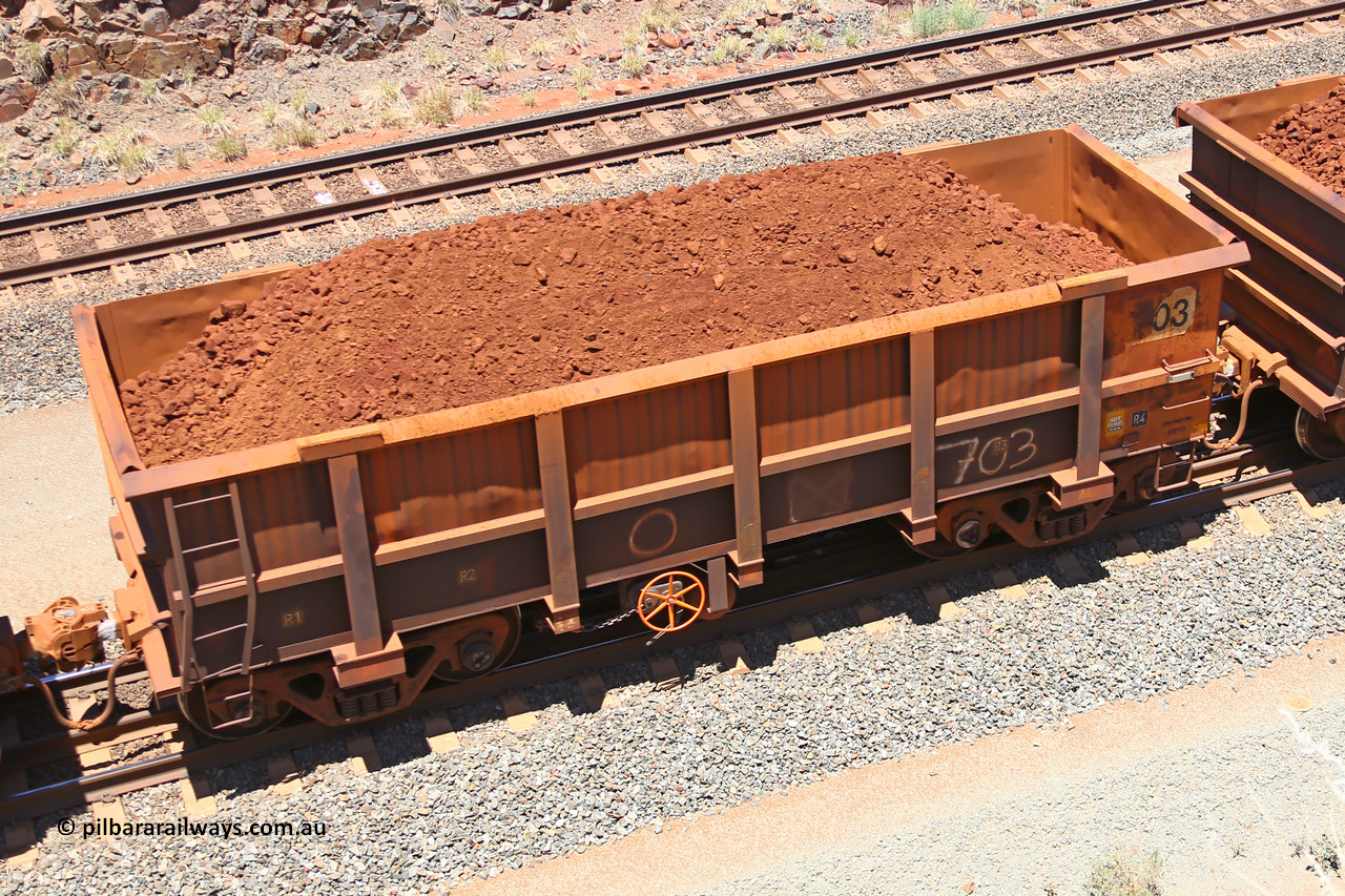 0703 160306 1458
Robe River ore waggon 703, built by Tomlinson Steel WA, fixed coupler handbrake side loaded view, at the 45 km, Harding Siding on the Cape Lambert line. March 6, 2016.
Keywords: 703;Tomlinson-Steel-WA;Robe-ore-waggon;