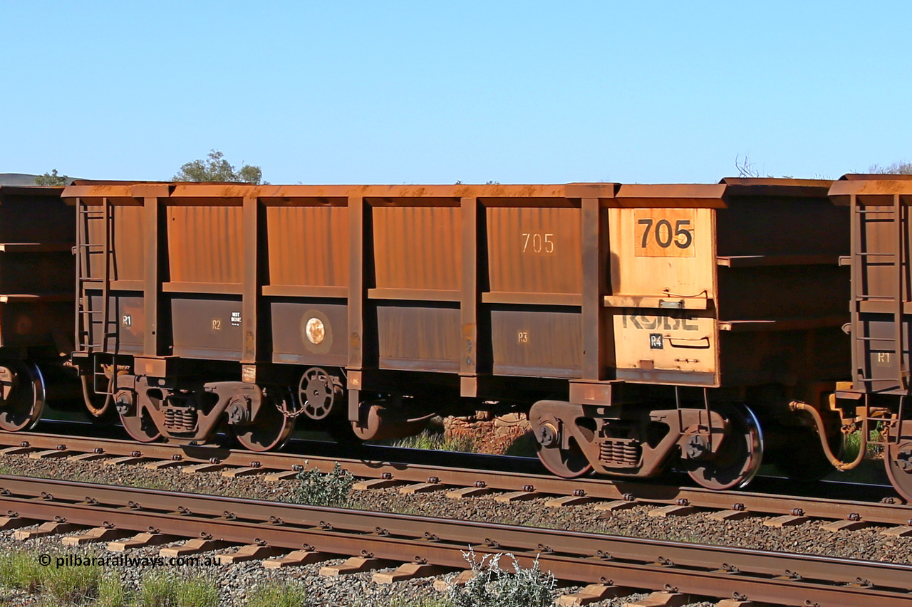 0705 160727 0965
Robe River ore waggon 705, built by Tomlinson Steel WA, rotary coupler end handbrake side empty view at Harding Siding on the Cape Lambert line, July 27, 2016.
Keywords: 705;Tomlinson-Steel-WA;Robe-ore-waggon;