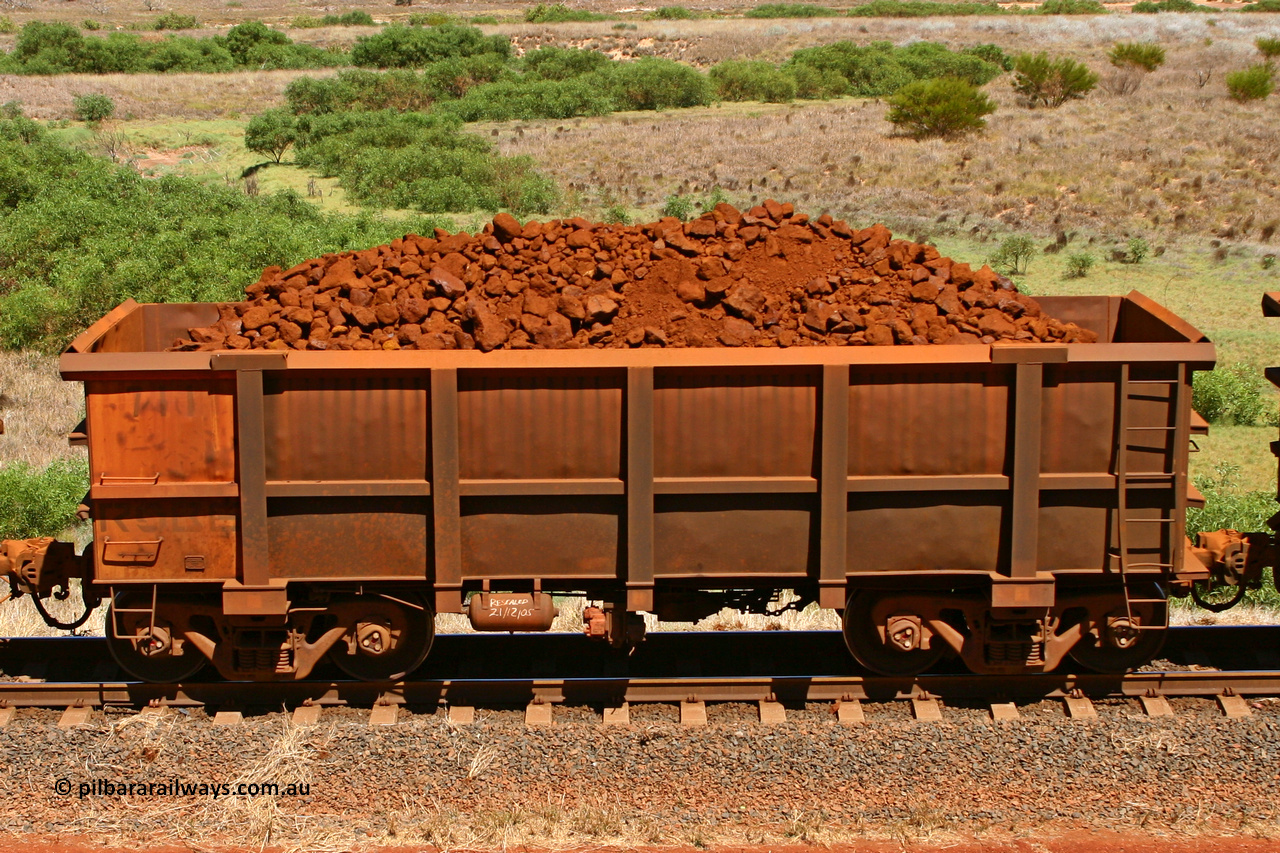 0711 061209 8190
Robe River ore waggon 711, built by Tomlinson Steel WA, fixed coupler non-handbrake side loaded view at the 7 km location just south of Cape Lambert yard. December 9, 2006.
Keywords: 711;Tomlinson-Steel-WA;Robe-ore-waggon;