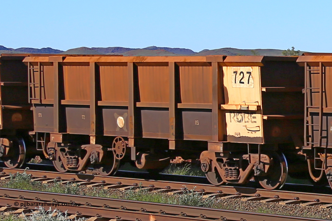 0727 160727 0965
Robe River ore waggon 727, built by Tomlinson Steel WA, rotary coupler end handbrake side empty view at Harding Siding on the Cape Lambert line, July 27, 2016.
Keywords: 727;Tomlinson-Steel-WA;Robe-ore-waggon;