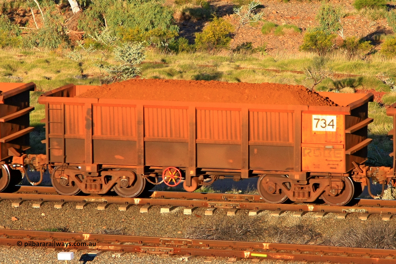 0734 110602 1665
Robe River ore waggon 734, built by Tomlinson Steel WA, rotary coupler end handbrake side loaded view at the 71 km, Western Creek on the Deepdale line. June 2, 2011.
Keywords: 734;Tomlinson-Steel-WA;Robe-ore-waggon;