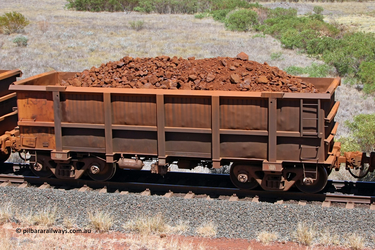 0735 081209 0154
Robe River ore waggon 735, built by Tomlinson Steel WA, fixed coupler non-handbrake side loaded view at the 7 km location just south of Cape Lambert yard. December 9, 2008.
Keywords: 735;Tomlinson-Steel-WA;Robe-ore-waggon;