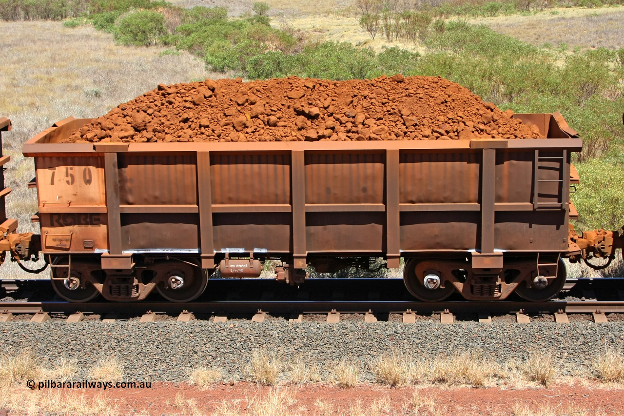 0750 081209 0145
Robe River ore waggon 750, built by Tomlinson Steel WA, non-handbrake side loaded view at the 7 km location just south of Cape Lambert yard. December 9, 2008.
Keywords: 750;Tomlinson-Steel-WA;Robe-ore-waggon;